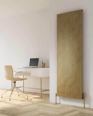 Regent brass vertical aluminium radiator set in a modern home office